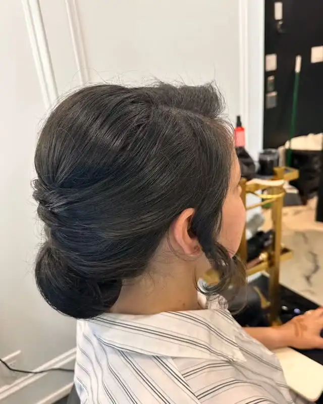 Smooth low chignon from the side