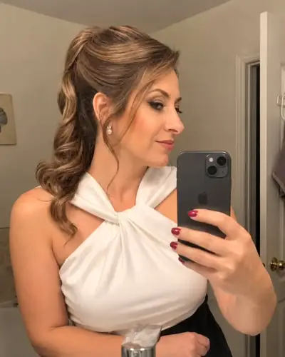 High ponytail with curls