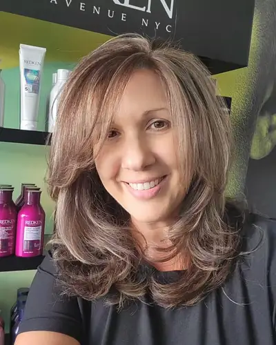 Shoulder length layered cut with volume